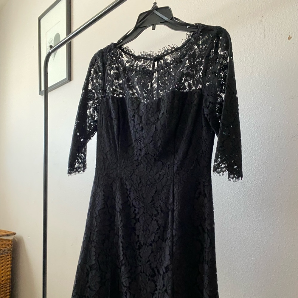 Black lace, mid-length, 3/4 sleeve cocktail/wedding guest dress.